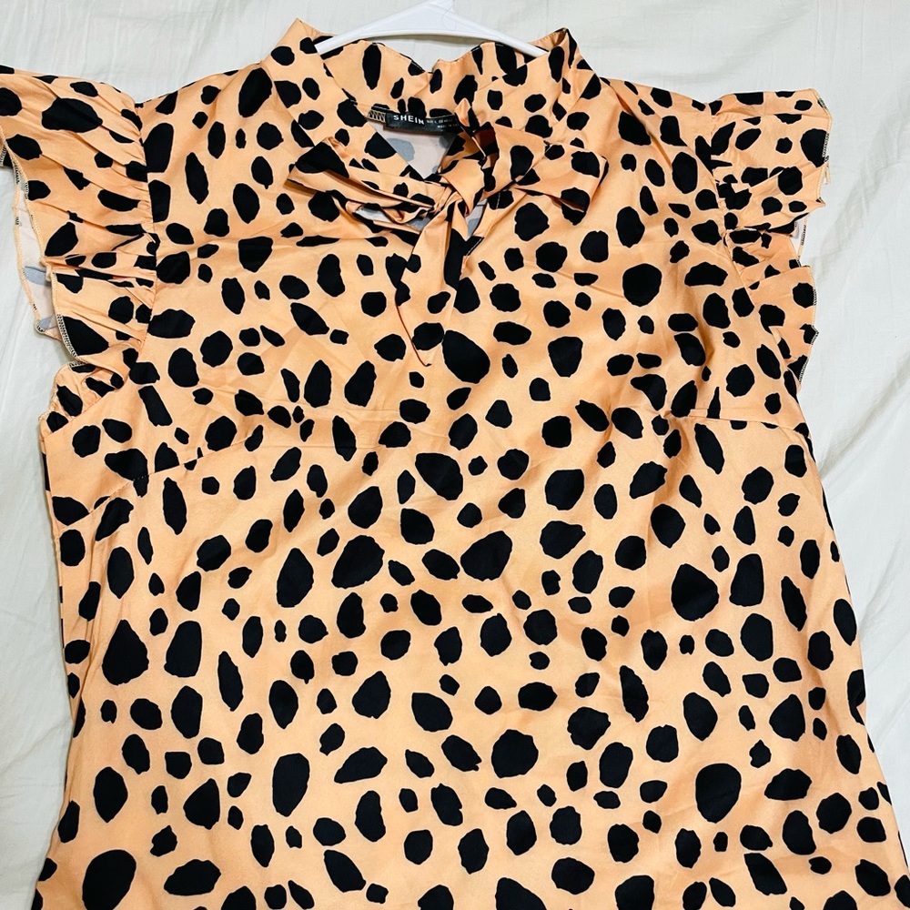 Orange and black blouse